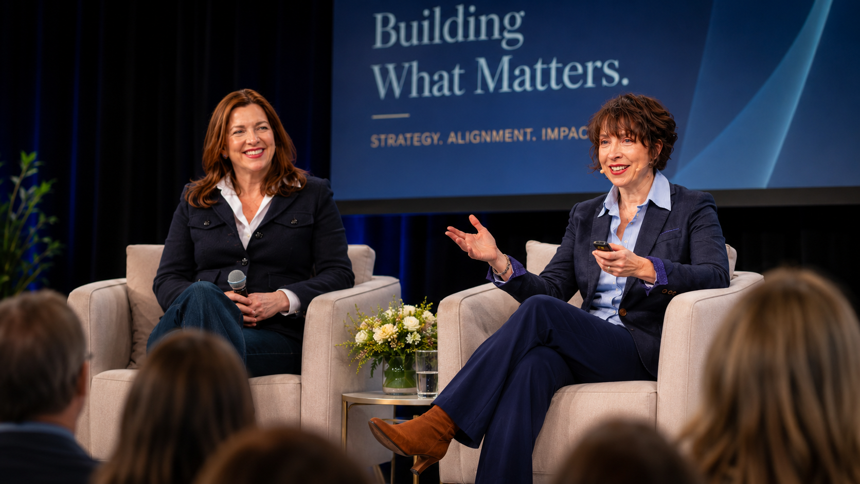 Professional keynote stage at an executive conference
